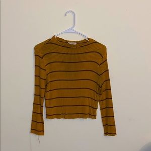 A yellow and black striped long-sleeve